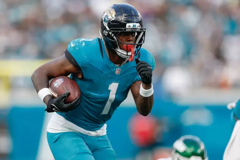 travis etienne — US news